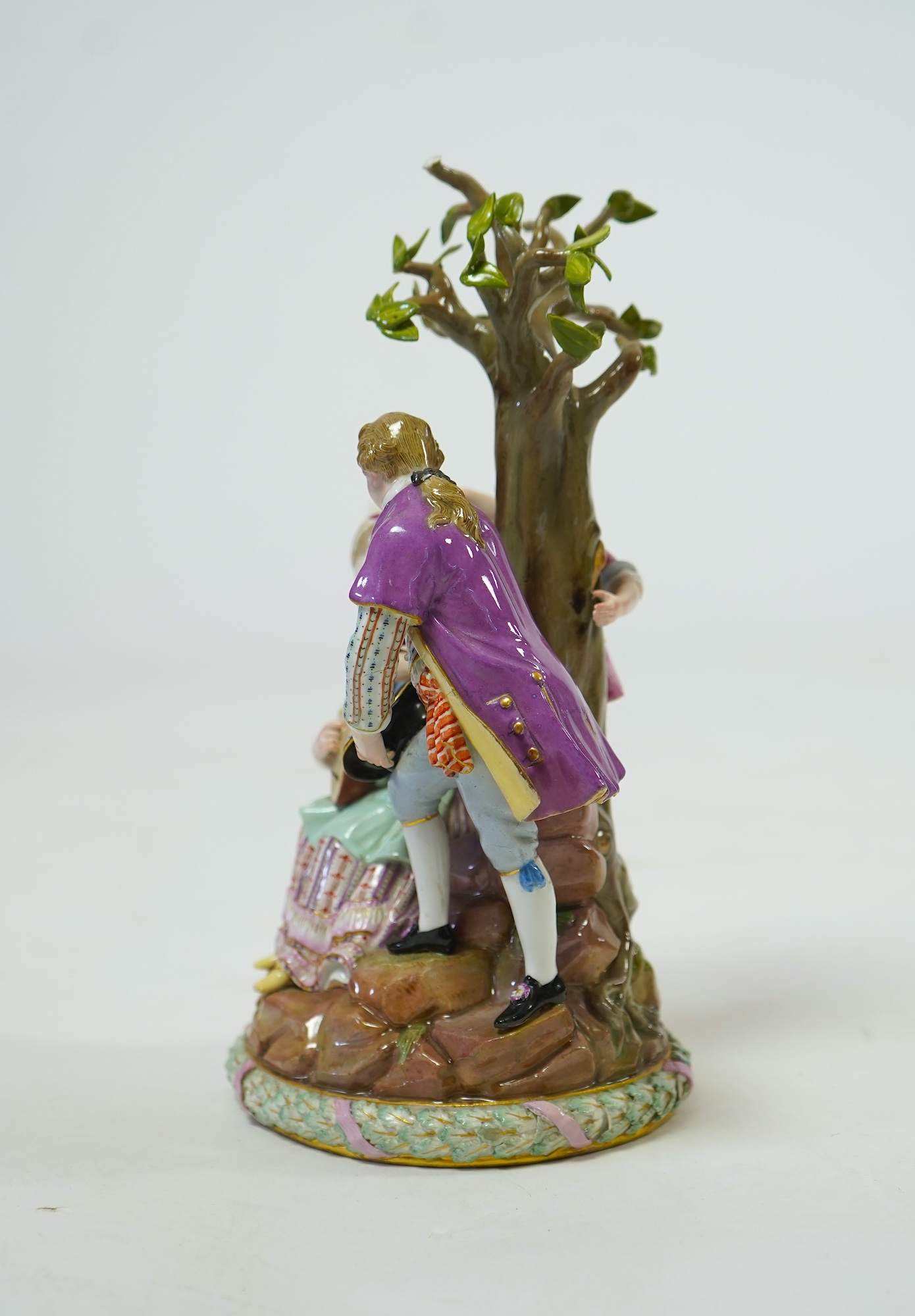A Meissen porcelain figure group of 'Gardeners' at the Apple Tree', late 19th century
